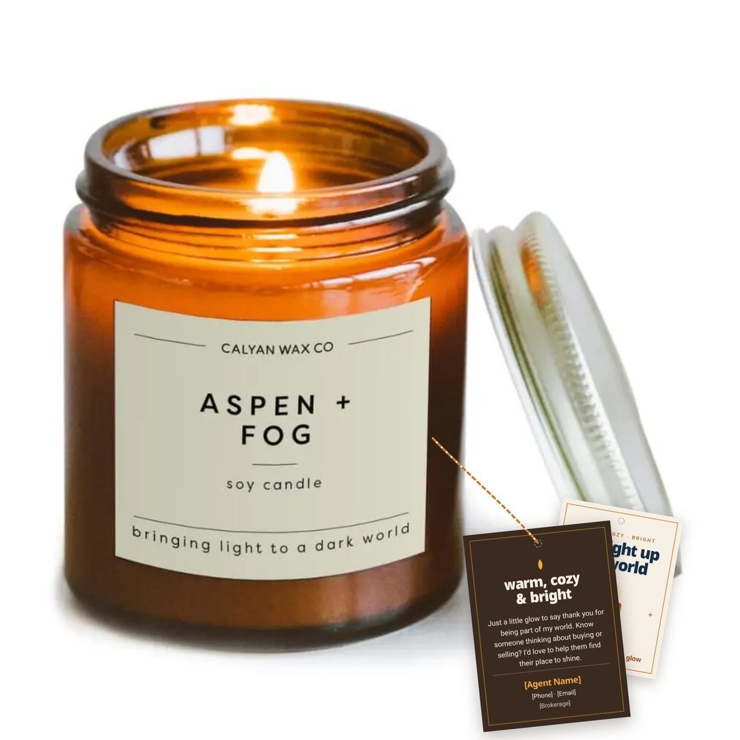 Amber soy candle with a branded you light up my world gift tag